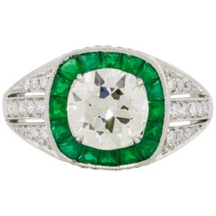 Platinum 1.72 Carat Old Euro Cut Center Diamond Ring with Emeralds