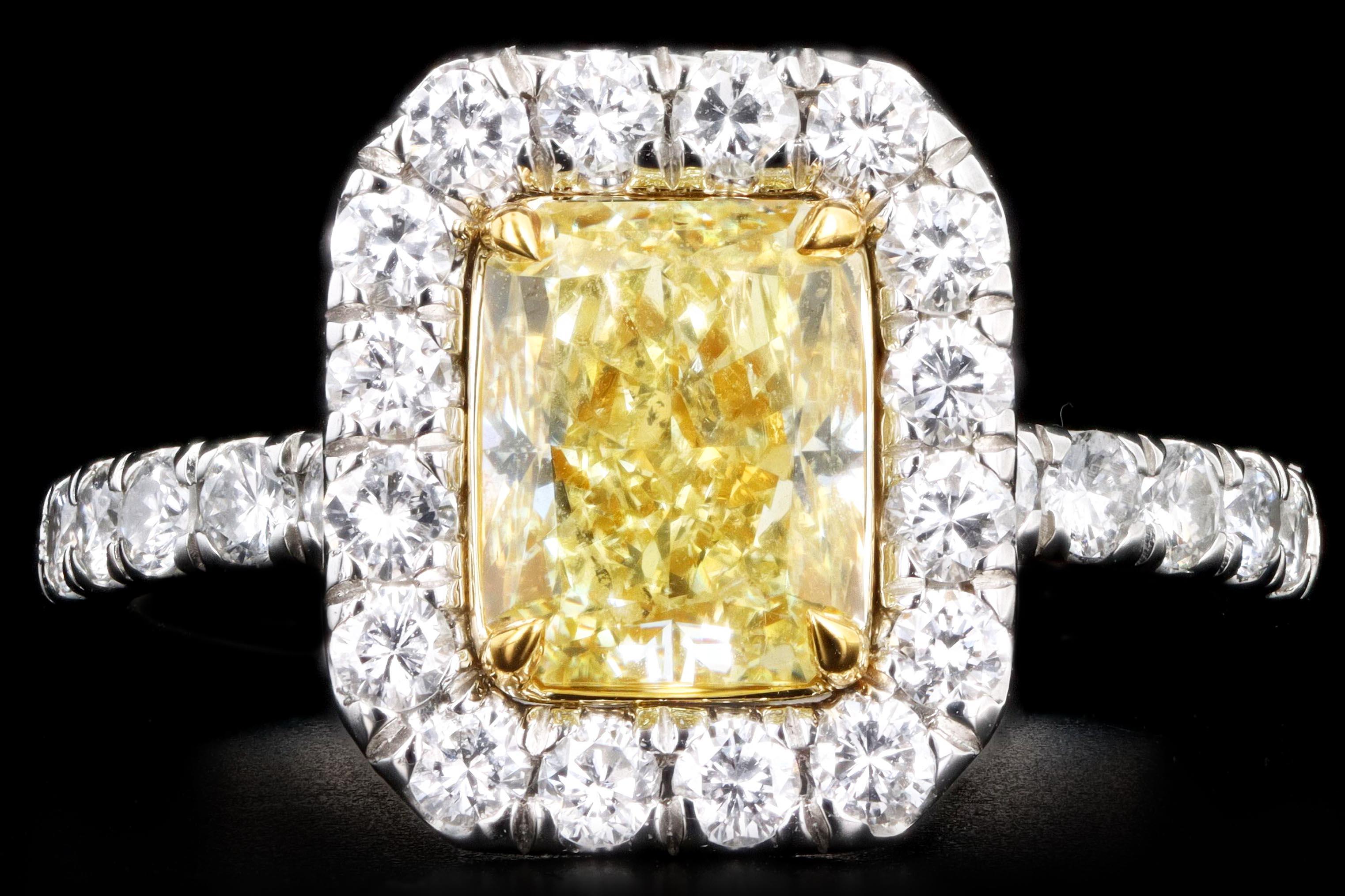 Era: New

Composition: Platinum

Primary Stone: Radiant Cut Diamond

Carat Weight: 1.73 Carats

Color: Natural, Fancy Yellow

Accent Stones: 28 Round Brilliant Cut Diamonds

Carat Weight: .75 Carats

Color: G-H

Clarity: Vs1/2

Total Carat Weight: