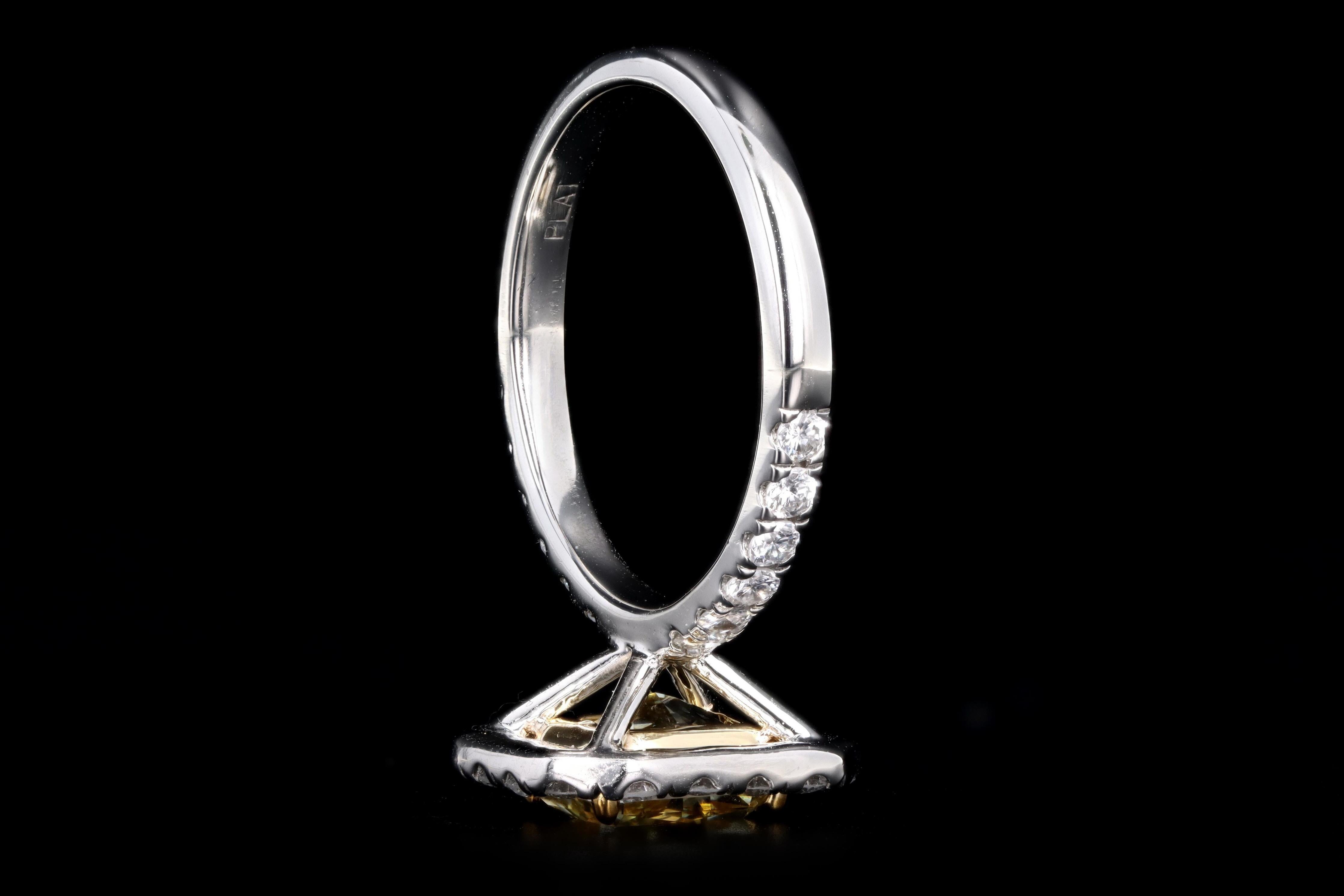 Women's Platinum 1.73 Carat Fancy Yellow Radiant Cut Diamond Ring