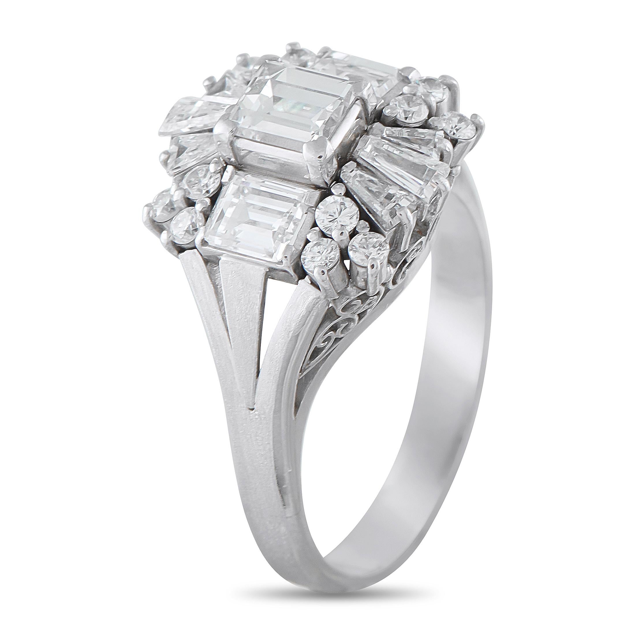 This exquisite ring radiates vintage inspired elegance. A 0.62 carat Diamond center stone is surrounded by additional Diamond accents totaling 1.17 carats at the top of this pieces chic Platinum setting. Ideal for any occasion, it features a 3mm top
