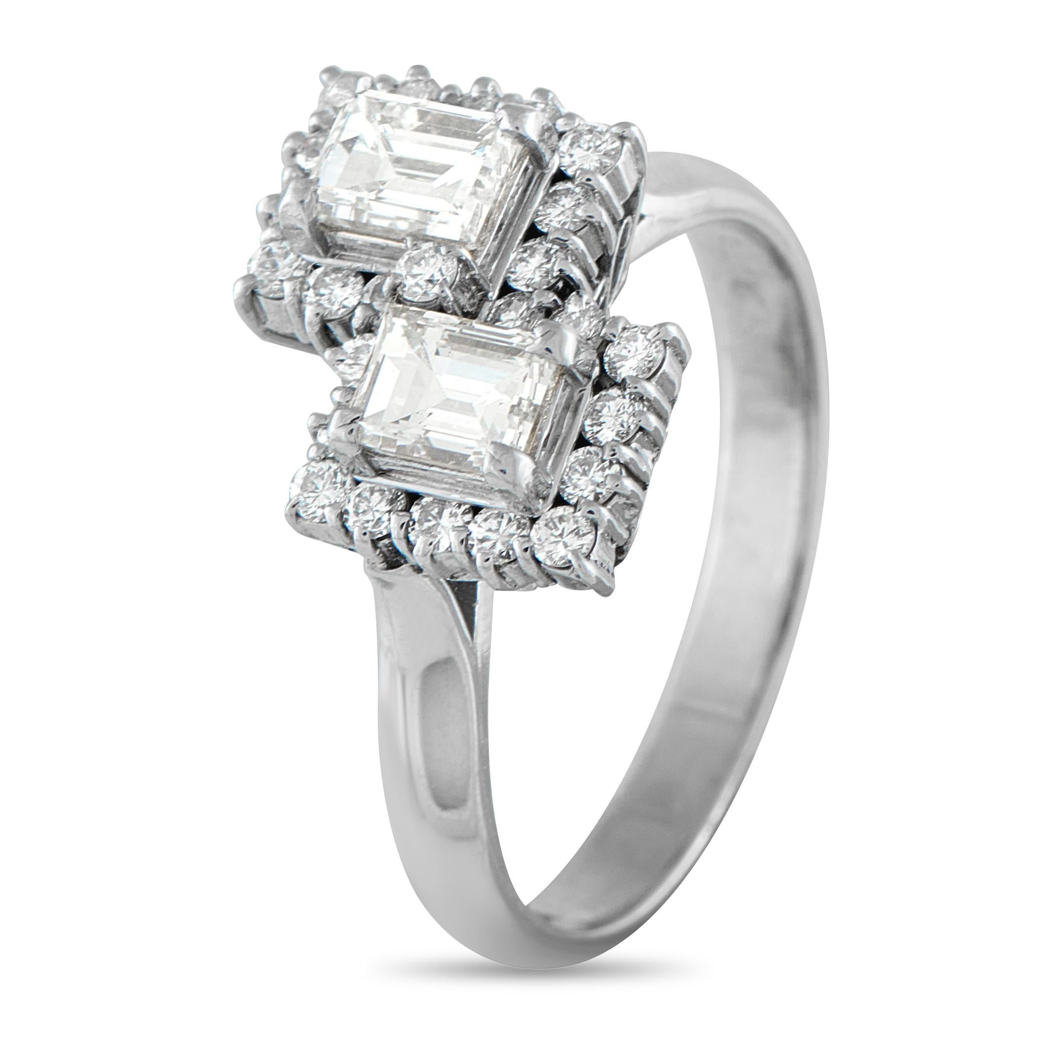 This simple, stylish ring offers a stunning twist on tradition. The Toi Et Moi design comes complete with twin Diamond center stones, meant to symbolize an endless connection between two people. Set in Platinum, it includes Emerald cut Diamonds