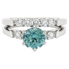 Conjunto de anillo de compromiso y alianza de platino con zafiro de Montana certificado por la GIA de 1,77 ct en total y diamantes