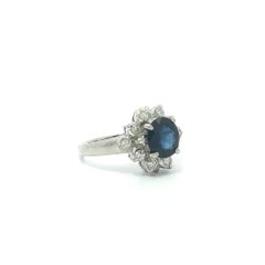 Platinum 1.7ctw Oval Deep Vibrant Blue Sapphire w/ Diamond Cluster Flower Ring