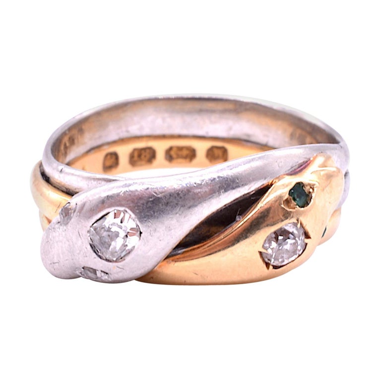 Platinum 18 Karat Snake Ring with Emerald Eyes and Diamond Studded Head