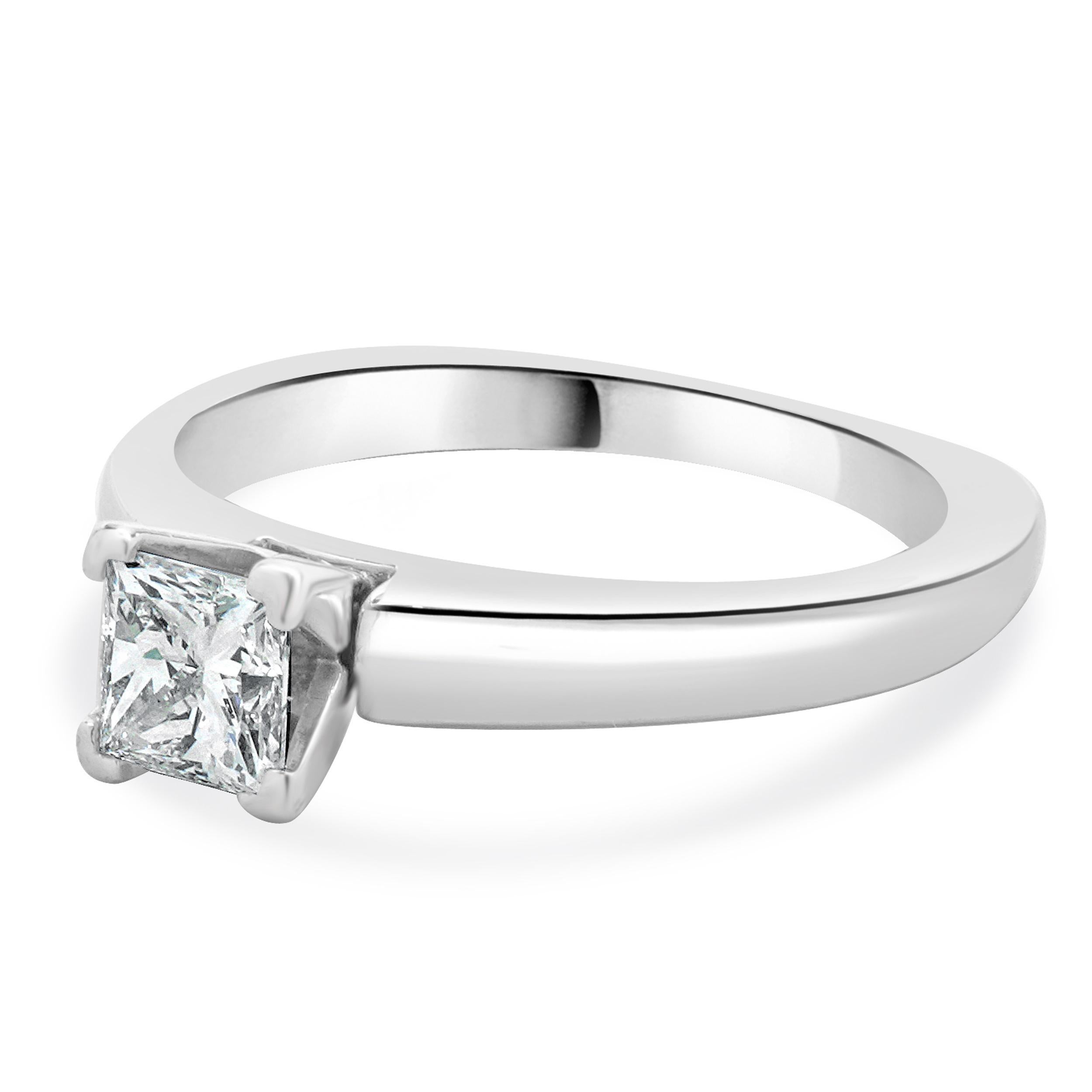 Designer: custom
Material: Platinum & 18K white gold
Center Diamond: 1 princess cut = 0.57ct
Color : E
Clarity : VS2
GIA: 15539732
Size: 6 complimentary sizing available 
Weight: 4.75 grams
