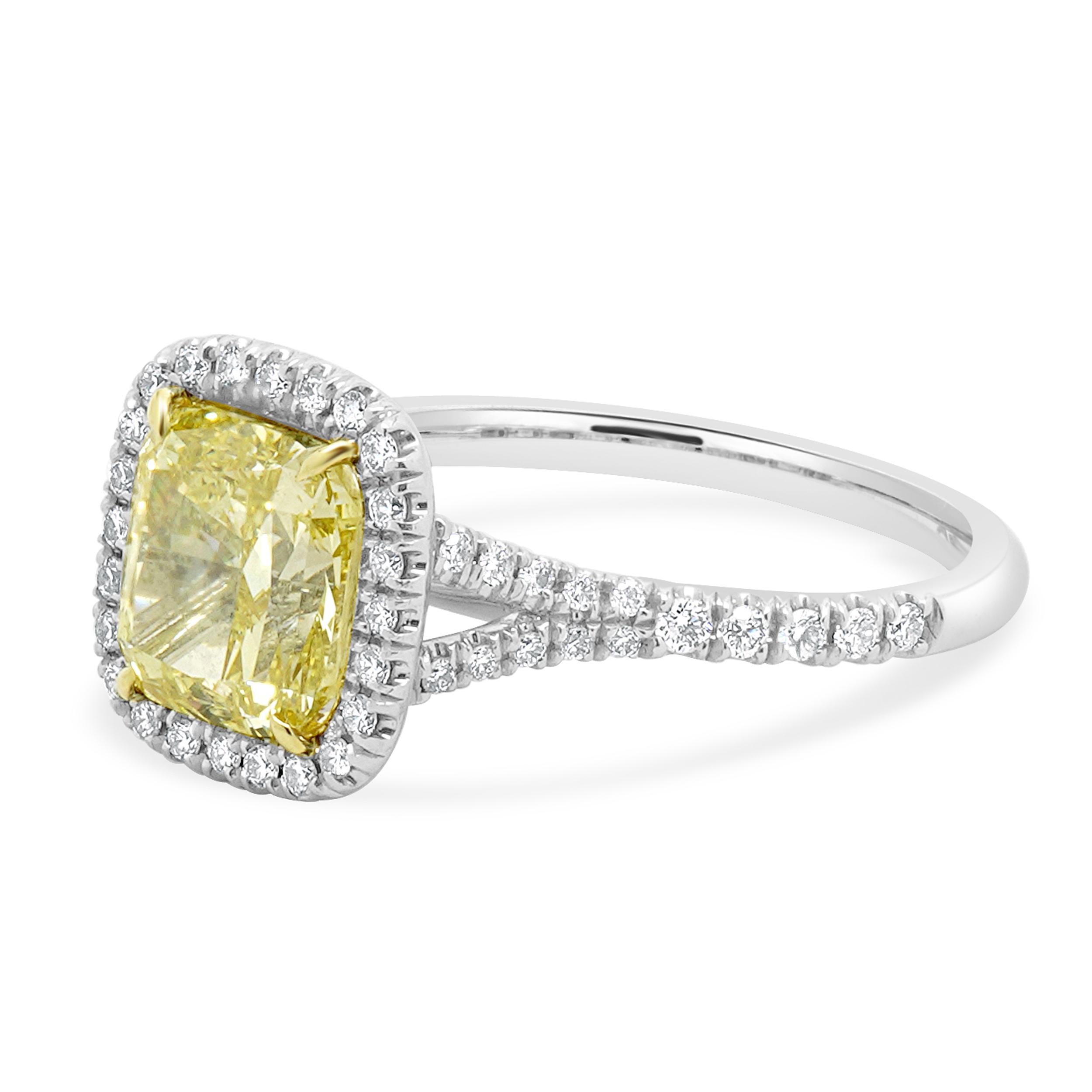 Material: Platinum & 18K yellow gold
Center Diamond: 1 cushion cut = 2.61ct
Color: Fancy Intense Yellow
Clarity: VS1
Diamond: 55 round brilliant cut = 0.33cttw
Color: G / H
Clarity: VS1-2
Ring Size: 7 (please allow up to 2 additional business days