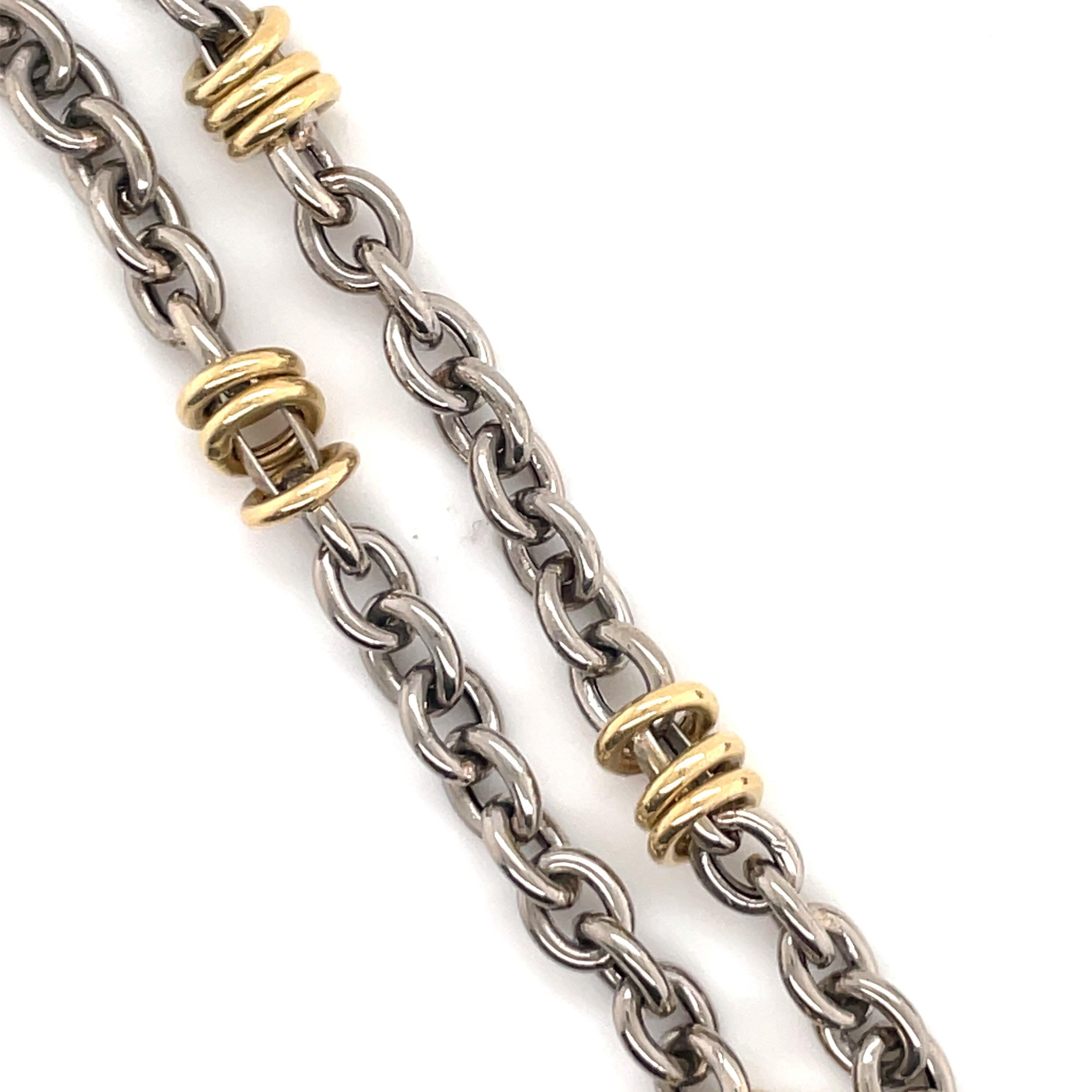 Platinum and 18 Karat yellow gold bracelet featuring small links weighing 10.8 grams, made in Italy.
Great for stacking.