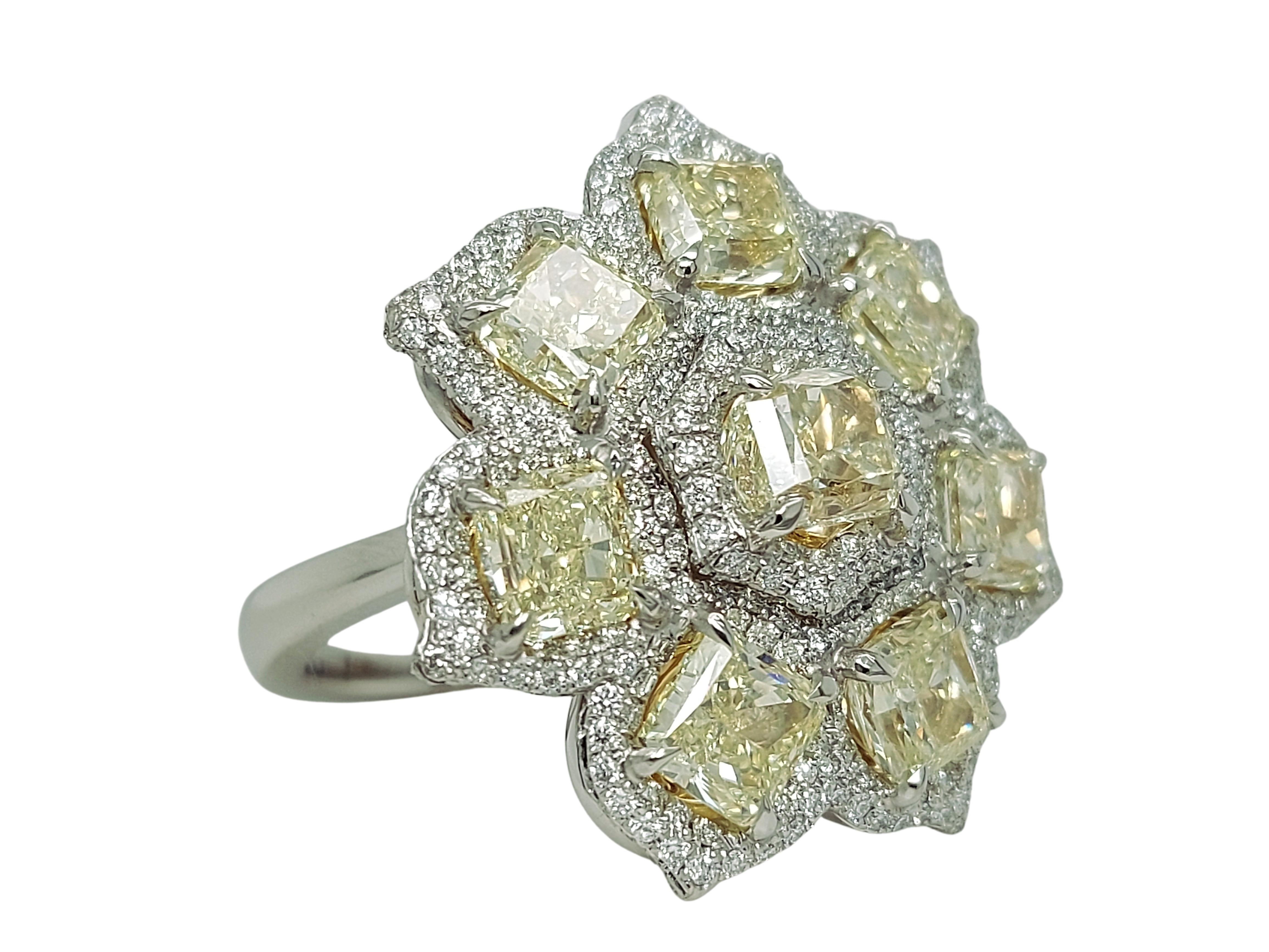 Platinum & 18 kt Pink Gold, 8.49 Ct Fancy Yellow Diamonds & 1.74 Ct Ring

Amazing One of a kind handcrafted High Jewellery Ring.

8.49 fancy yellow diamonds
1.74 ct 400 smaal Brilliant Cut diamonds 
platinum and pink gold