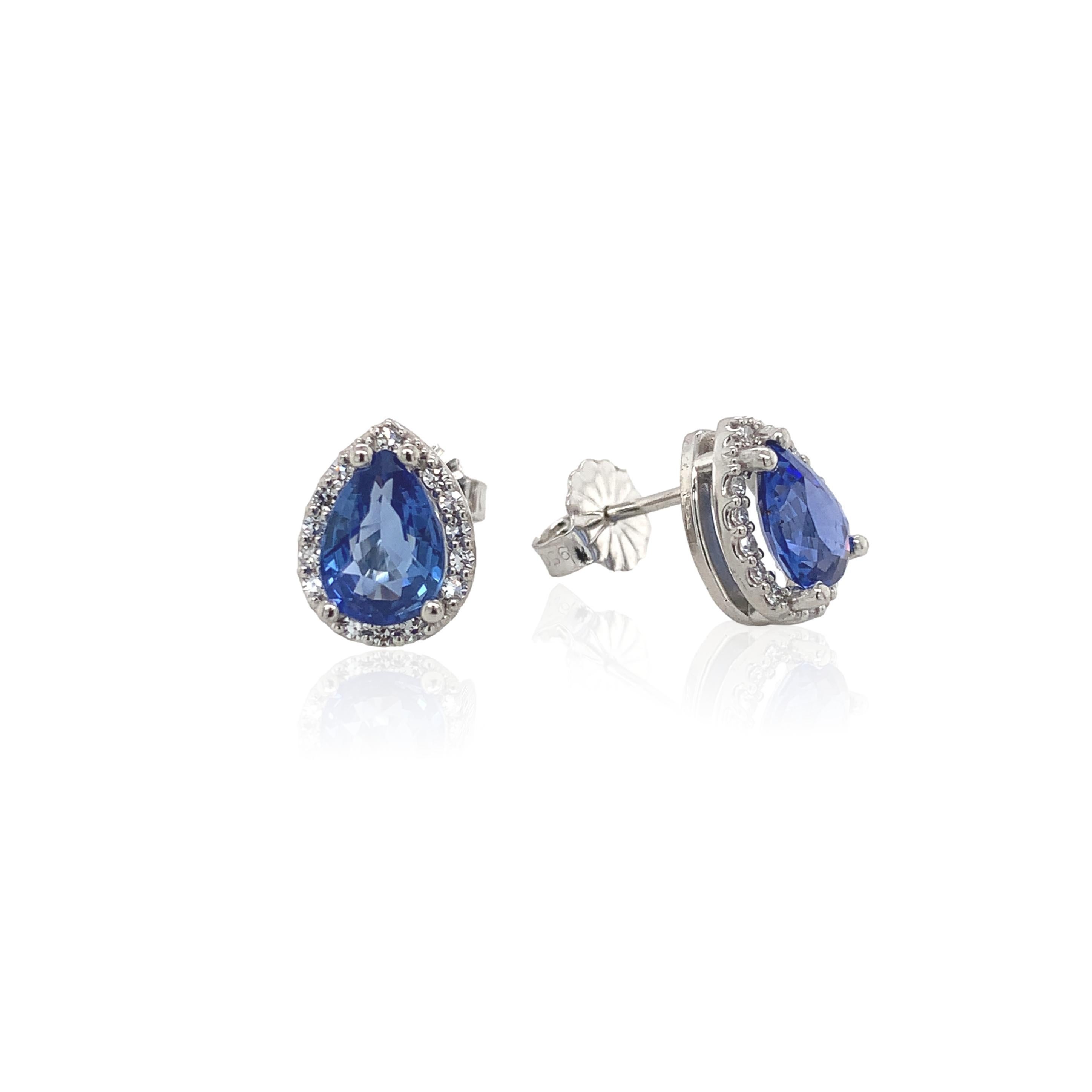 Modern Platinum 1.80cttw Blue Sapphire Stud Earrings with Diamond Halo For Sale