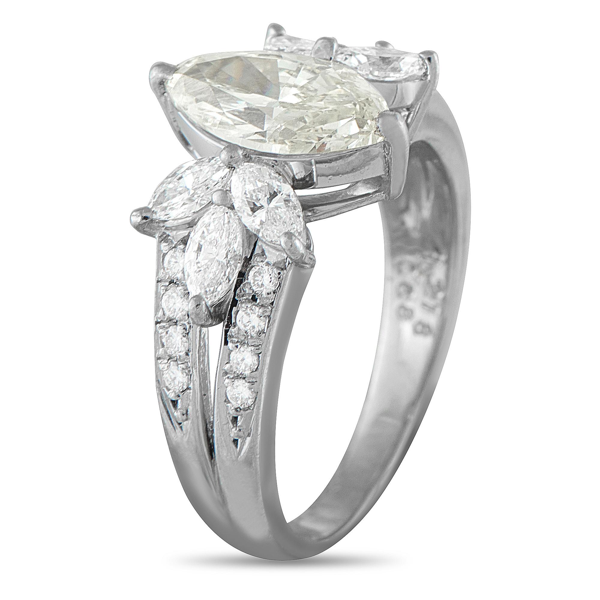 This exquisitely crafted ring will continually catch the light. The classic design includes a 1.21 carat marquise-cut Diamond center stone as well as sparkling Diamond accents totaling 0.68 carats. Set in Platinum, a 2mm wide band and a 6mm top