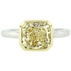 Platinum & 18k Gold 2.55 Carat GIA Fancy Yellow Diamond Solitaire Bezel Set Ring