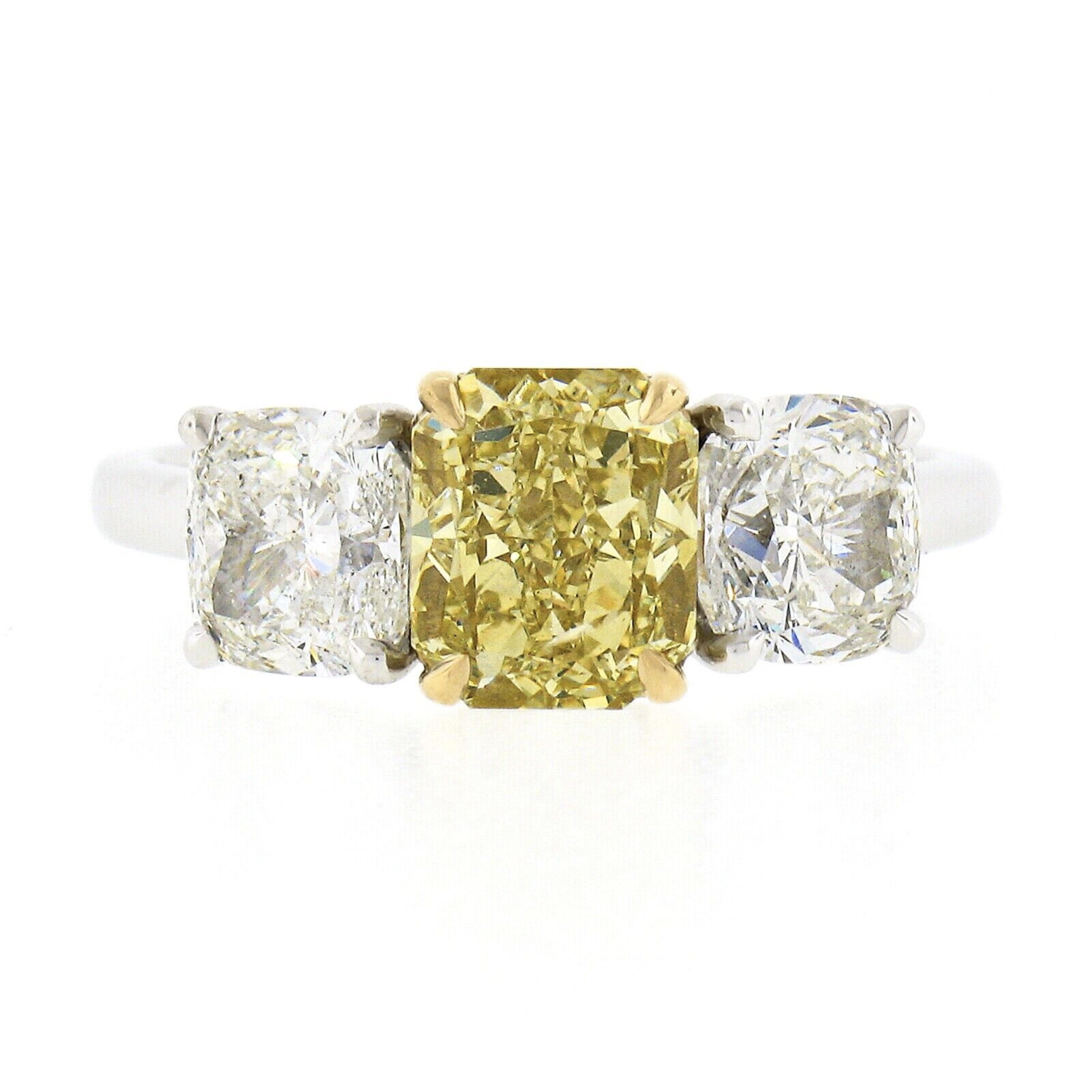 Platinum 18k Gold 3.47ct GIA Fancy Yellow & White Cushion Diamond 3 Stone Ring In New Condition For Sale In Montclair, NJ