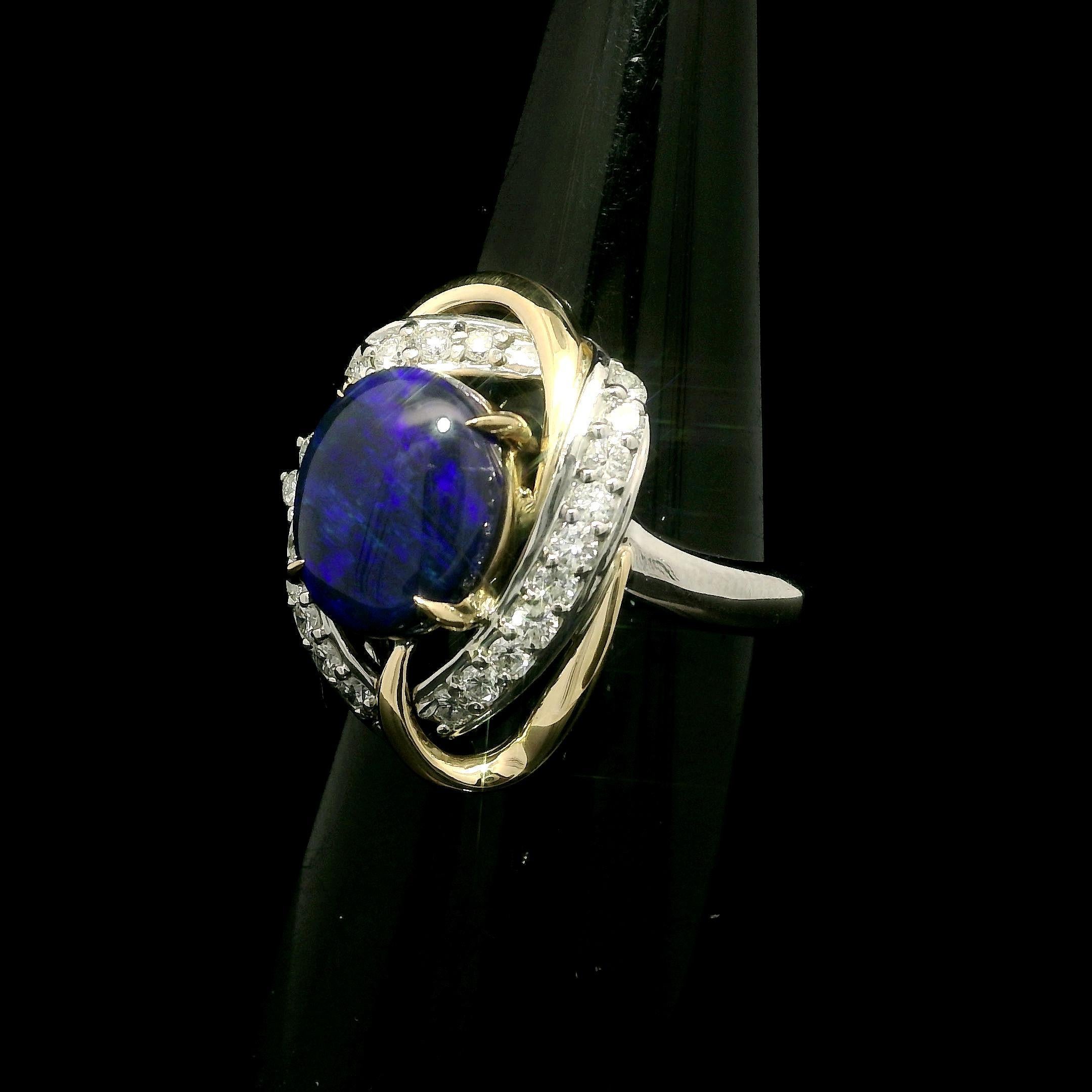 --Stone(s):--
(1) Natural Genuine Opal - Oval Cabochon Cut - Prong Set - Blue Color on Black Background - 10x8mm - 2.2ct (exact)
(21) Natural Genuine Diamonds - Round Brilliant Cut - Prong & Pave Set - G/H Color - VS2/SI1 Clarity - 0.40ctw