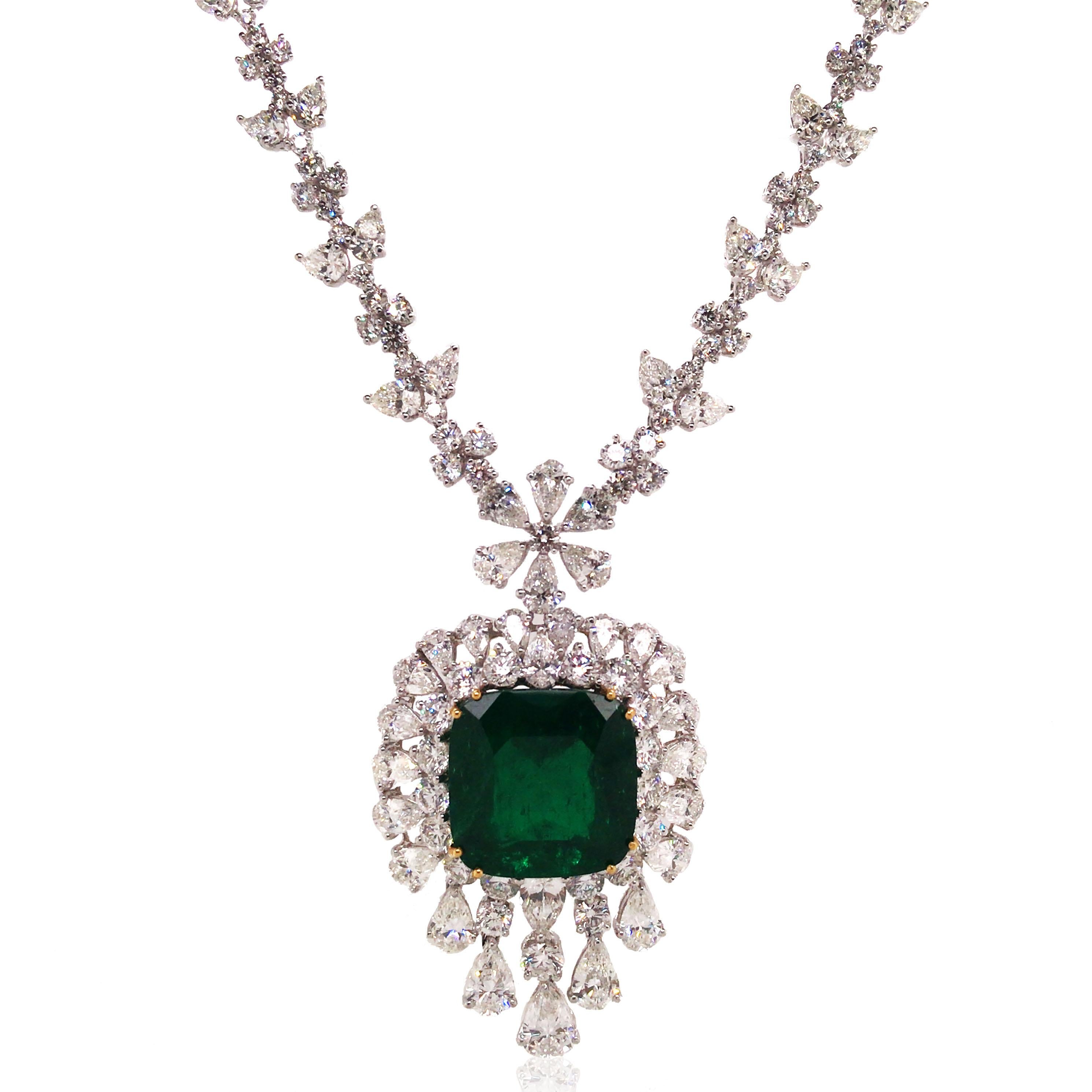 This emerald diamond necklace is finely crafted in 18k gold and platinum. It consists of 1 emerald-cut emerald, 93 pear-cut diamonds and 220 round-cut diamonds. The emerald approx. 20ct and the diamond approx. 33.8ct in total. 

Diamond: