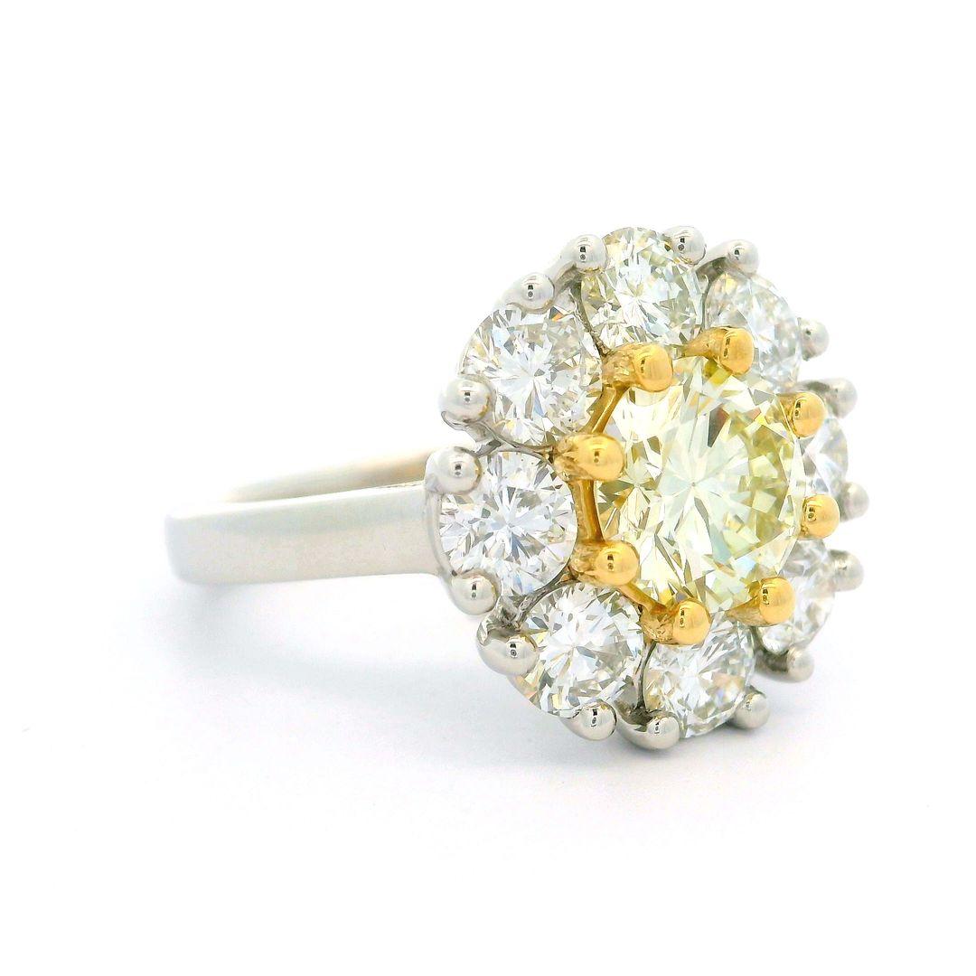 -Stone(s):--
(1) Natural Genuine Diamond - Round Brilliant Cut - Multi Prong Set - Light Yellow, Q/R Color - VVS2 Clarity - 1.60ct (exact - certified)
** See Certification Details Below for Complete Info **
(8) Natural Genuine Diamonds - Round