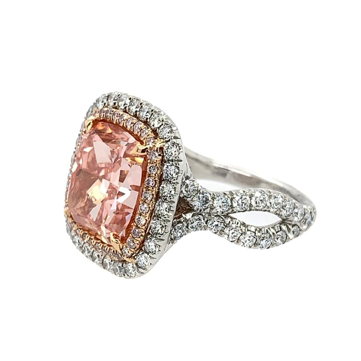 Glc0071:


Plat & 18k rose gold:

Center: 8.05ct Cushion cut

Color HPHT Fancy Intense Pink

VVS

Accent dia: 1.72ct pink and white.

GIA certificate