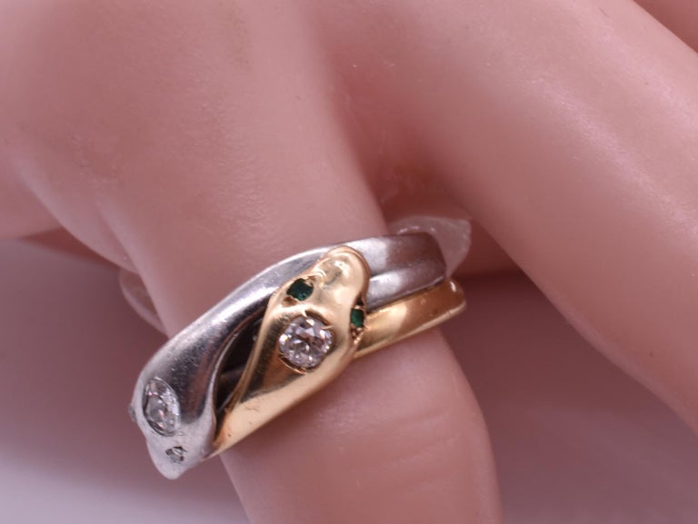 Platinum 18 Karat Snake Ring with Emerald Eyes and Diamond Studded Head