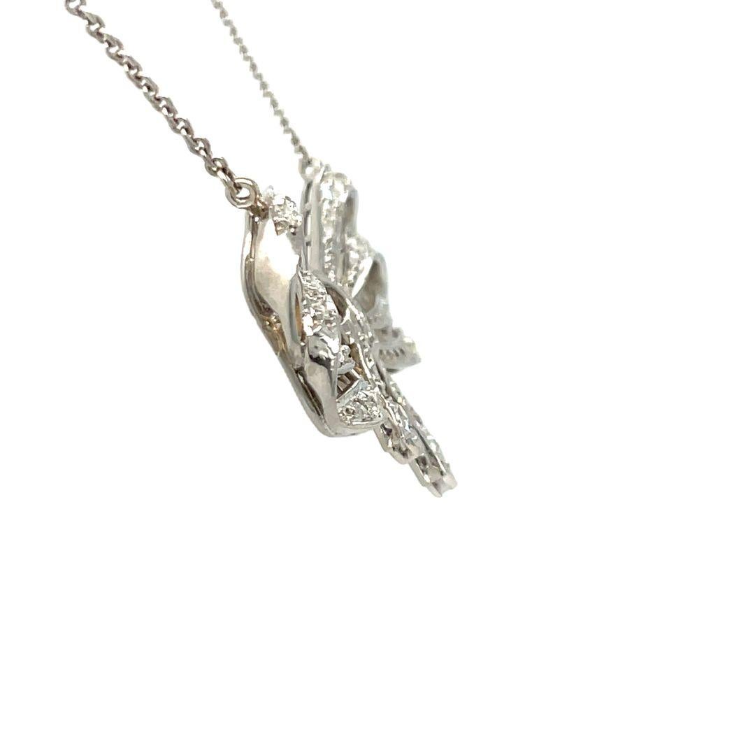 Platinum/ 18K White Gold Antique Cut Diamond Bow Ribbon Necklace Pendant  In Excellent Condition For Sale In beverly hills, CA