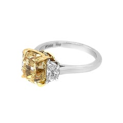 Platinum and 18 Karat White Gold Cushion Cut Half Moon Light Yellow Diamond Ring