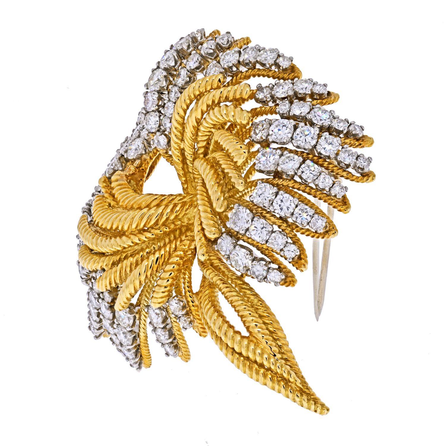 Platinum & 18K Yellow Gold 1960's Spray Of Diamonds 8.50cts Fluted Brooch.
L: 6cm
W: 5.6cm
Double pin closuser.