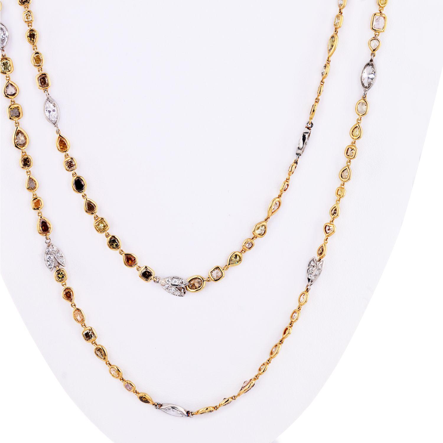 Platinum & 18K Yellow Gold 41 carat Fancy Color And White Diamonds by the Yard Necklace.
Handmade with our in-house jewelers this is a fun and lively necklace featuring 208 natural colored diamonds, and 91 white diamonds.
Total carat weight 41cttw.
