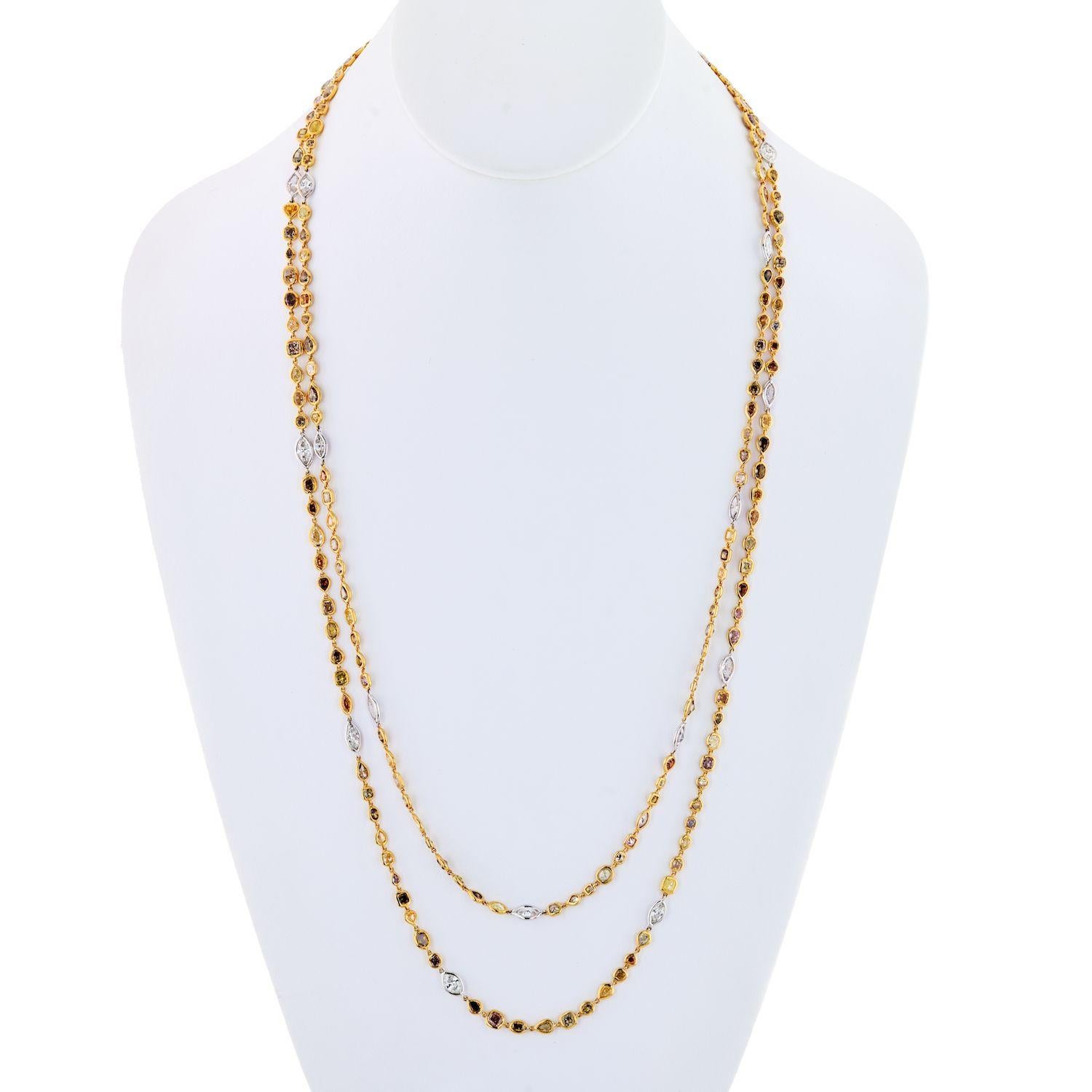 Platinum & 18K Yellow Gold 41 carat Fancy Color And White Diamonds by the Yard Necklace.
Handmade with our in-house jewelers this is a fun and lively necklace featuring 190 natural colored diamonds, and 19 white diamonds.
Total carat weight 36cttw.
