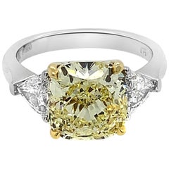 Platinum and 18 Karat Yellow Gold Cushion Cut Natural Fancy Yellow Diamond Ring