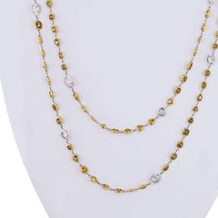 Platinum and 18k Yellow Gold Fancy Color and White Diamonds by the Yard Necklace
