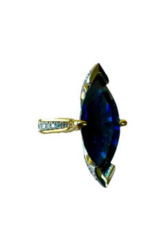 Platinum 18K Yellow Gold GIA Certified 7.56 Carat Marquise Blue Sapphire Ring