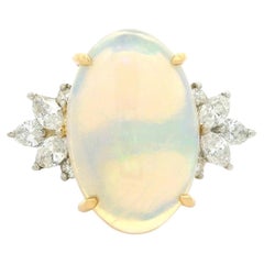 Anello in platino e oro giallo 18 carati con opale ovale grande e diamante a spruzzo laterale