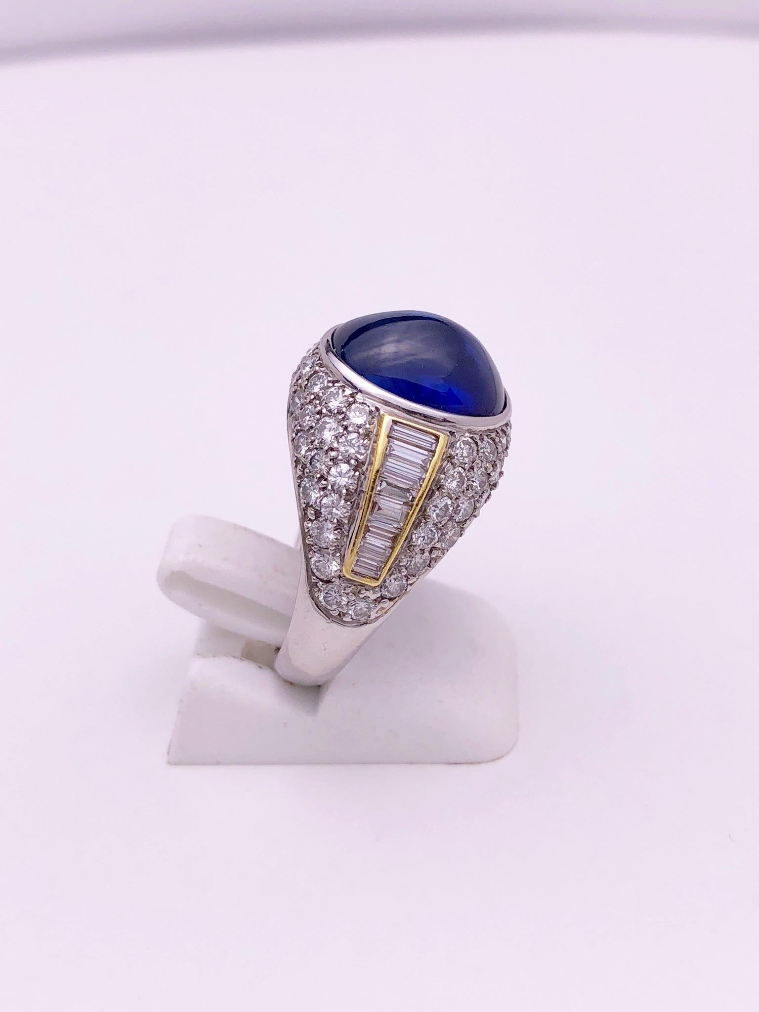 Oval Cut Platinum and 18KT Dome Ring with 6.85Ct. Cabochon Sapphire, and 2.78Ct. Diamonds For Sale