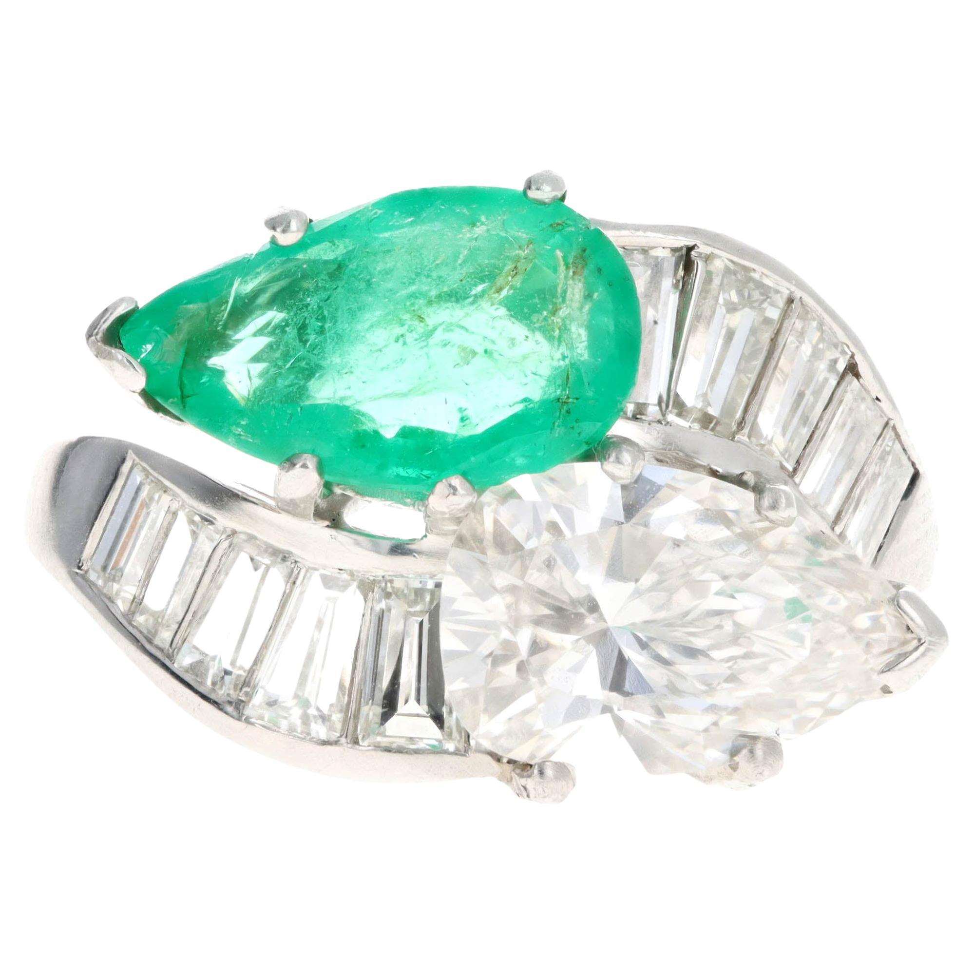 Platinum 1.91 Carat Pear Diamond & 1.5 Carat Natural Emerald Toi Et Moi Ring For Sale