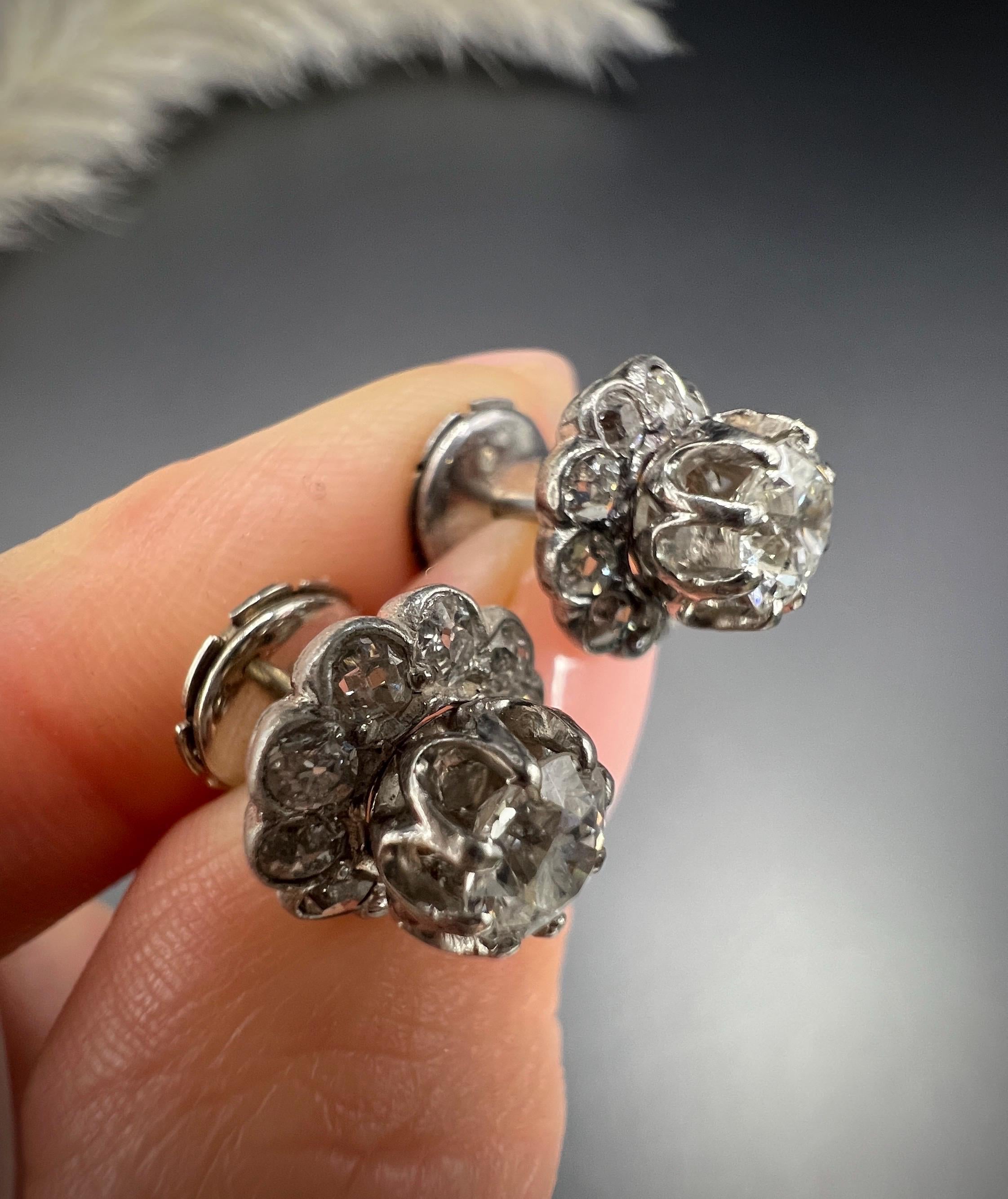 Antique Diamond Studs

Platinum Tested 

Circa 1920s

Discover a truly unique pair of 1920s diamond earrings that offer versatile styling options. Crafted with exquisite attention to detail, these stunning studs can be worn in two fabulous ways.