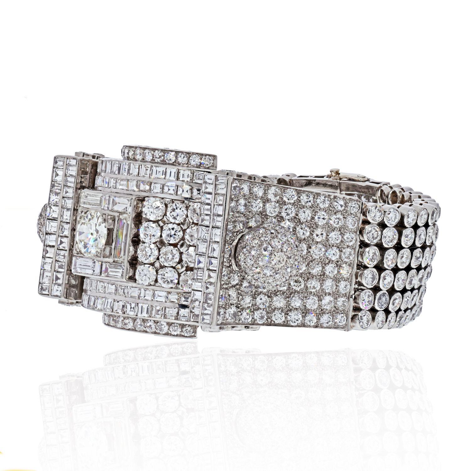 Very elaborate Platinum 1930's Art Deco 60 Carat Diamond Bracelet. Designed with impressive prong, bezel and channel solid openwork pattern set with old European cut diamond in the middle with diamond weight at approximately 60.00 carats. 
Center