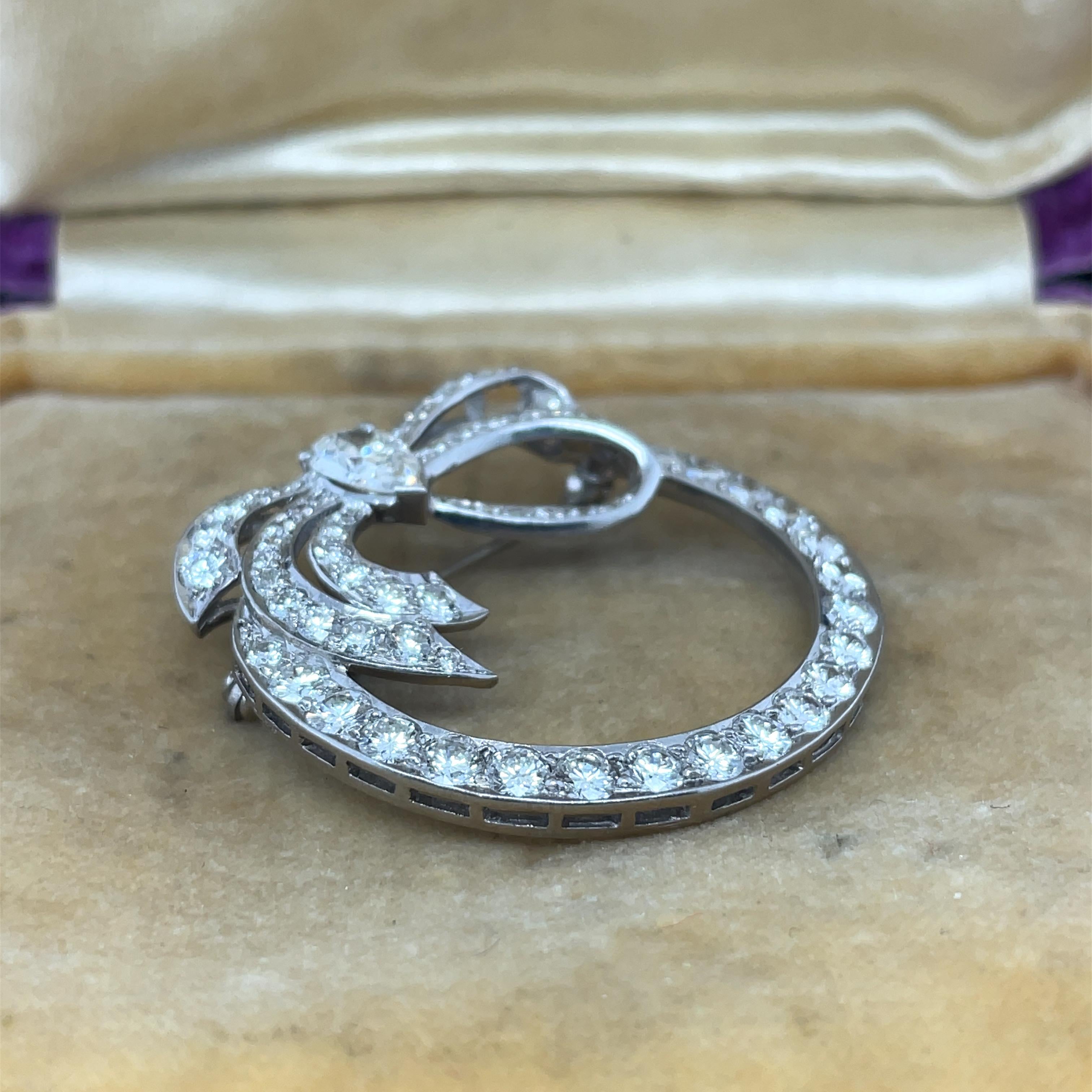 Platinum 1940s Gia Pear Shape & Round Diamond Ribbon Brooch In Excellent Condition For Sale In Atlanta, GA