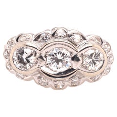 Retro Platinum 1950s Three Stone Engagement Ring with Arthritic Shank