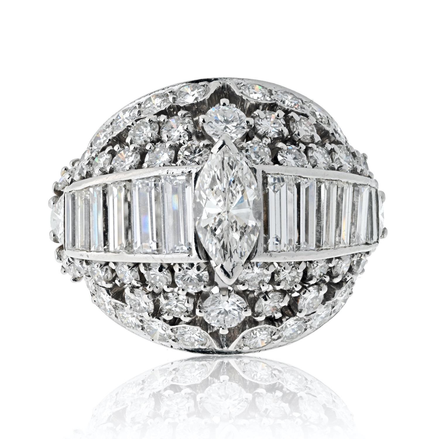 Step back into the glamorous 1970s with this exquisite Platinum Diamond Bombe 5.75cttw Ring, a stunning example of vintage elegance and craftsmanship. This remarkable piece features a bold, domed design that showcases a breathtaking array of