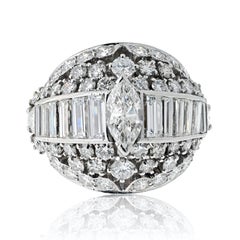 Platinum 1970's Bombe Marquise Cut And Round Cut Diamond Ring