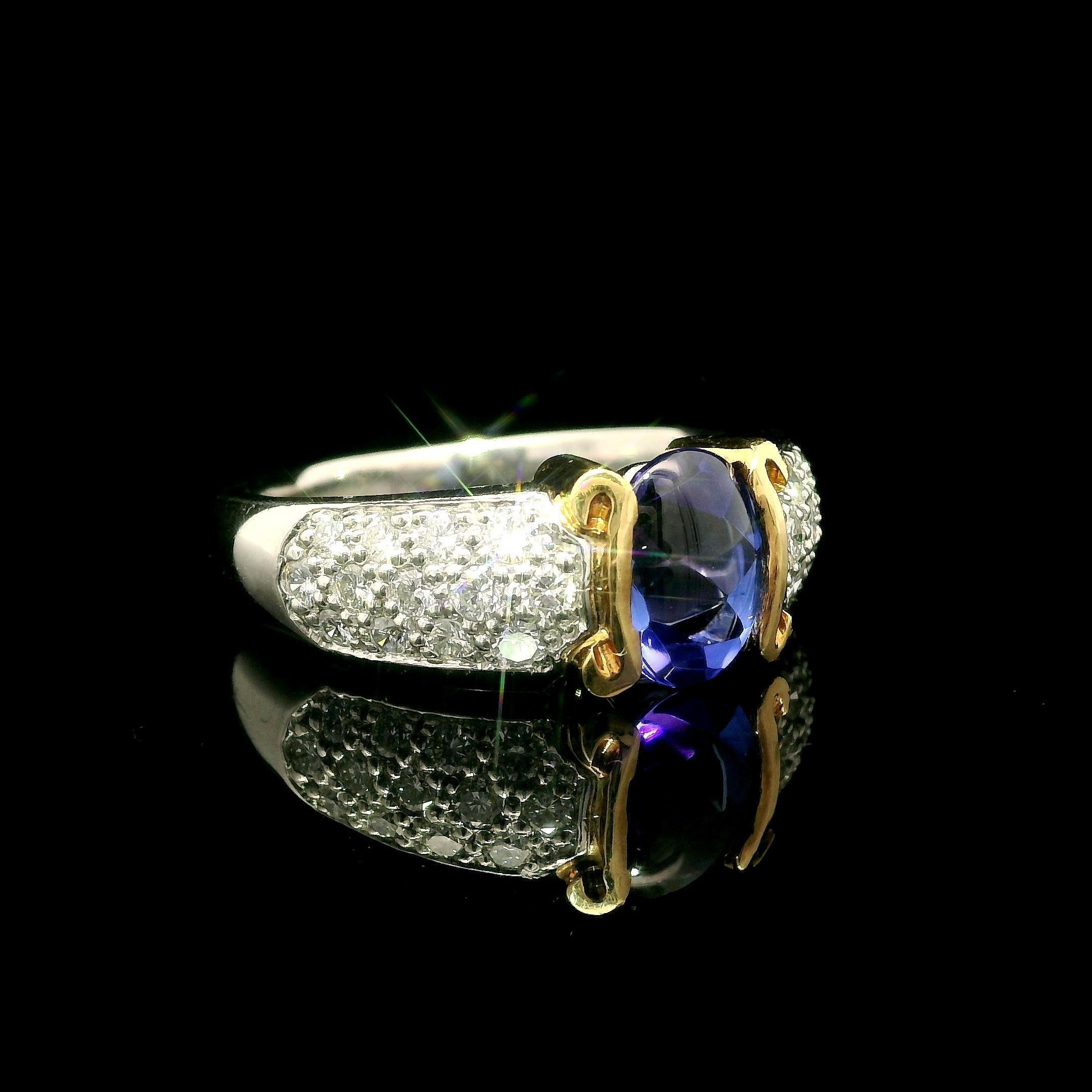 Anillo de platino de alta calidad con tanzanita ovalada de 1,99 quilates y diamantes pavé en venta 7