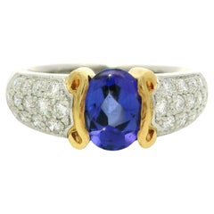 Anillo de platino de alta calidad con tanzanita ovalada de 1,99 quilates y diamantes pavé