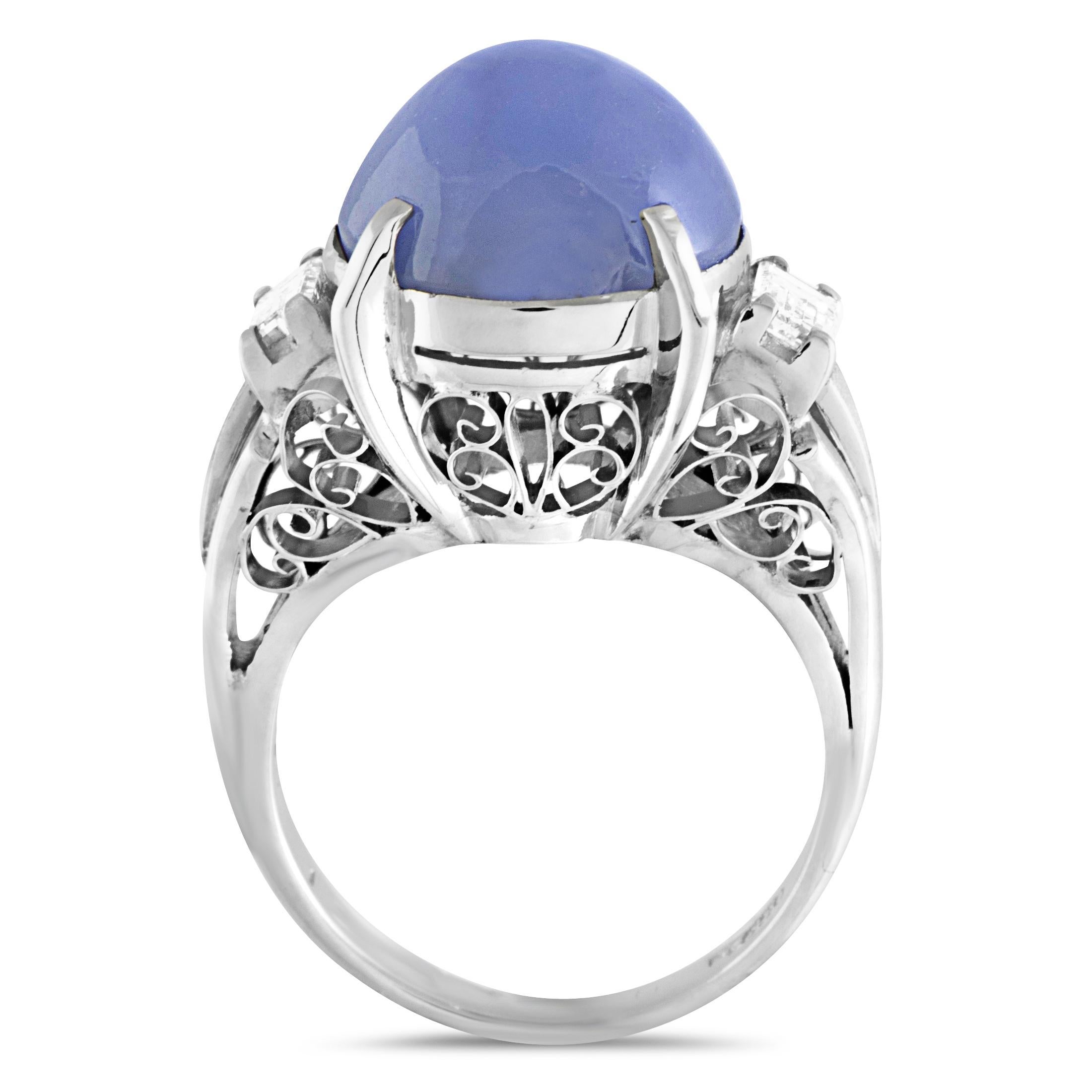 This beautiful platinum ring compels with its exceptionally elegant design and incredibly opulent décor. The extravagant ring is set with 0.40ct of sparkling diamonds around a magnificent 12.25ct star sapphire.
Ring Top Dimensions: 17mm x 13mm