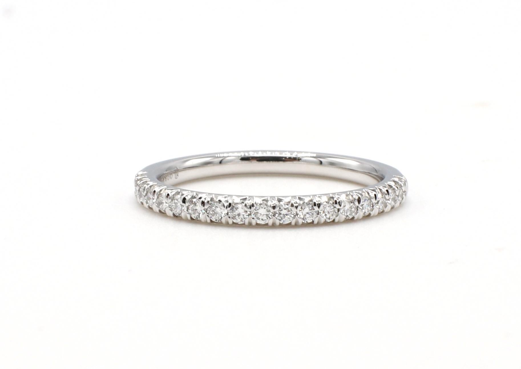 Platinum .20 Carat Round Diamond Half Wedding Band Ring
Metal: Platinum
Weight: 3.25 grams
Diamonds: Approx. .20 CTW G VS round diamonds
Size: 6 (US)
Width: 2mm
Signed: PT950 Blue Nile Hallmark 