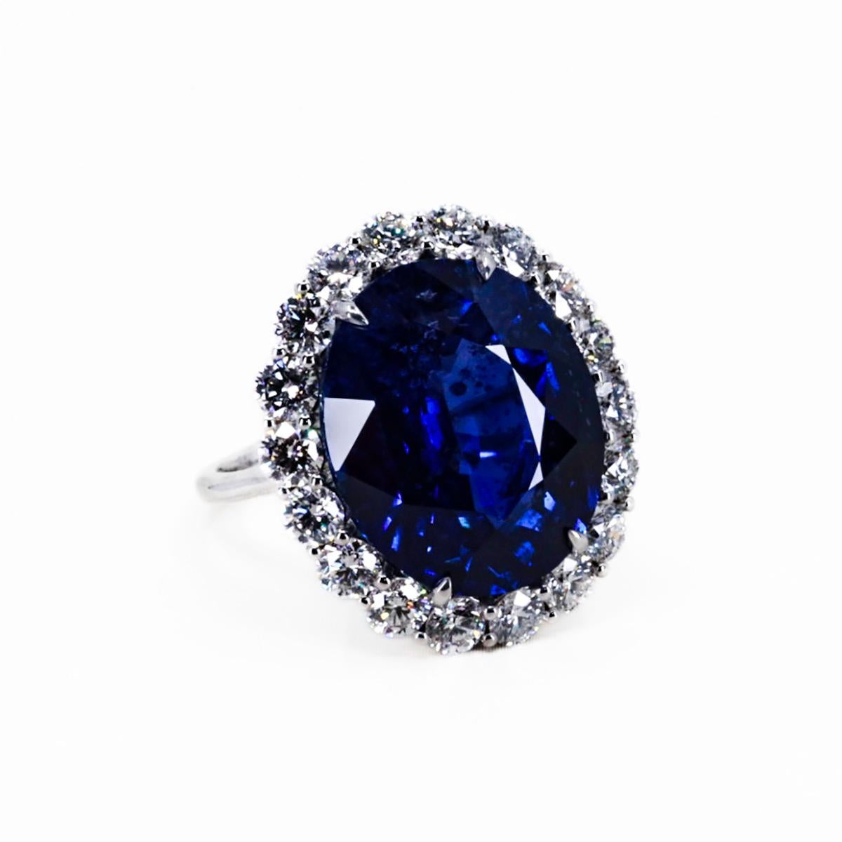 Top Gem 20.12 carat, vivid royal blue Ceylon sapphire set in platinum mounting with 2.65 carats of collection color/clarity round brilliant diamonds