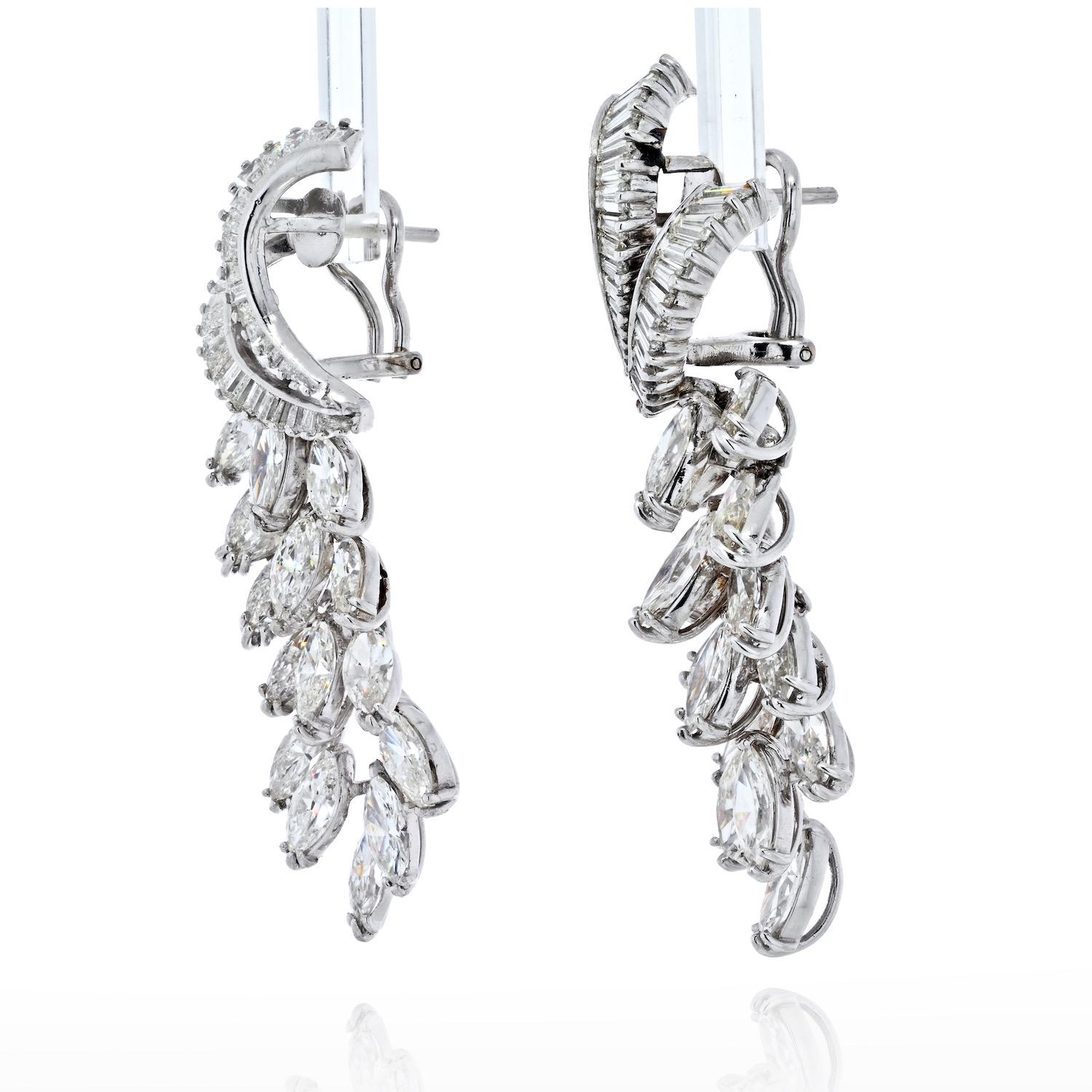 Inspired by elegance, these gorgeous scatter drop earrings frame your face with the sparkle of breathtaking baguettes and shimmering marquise-shape diamonds.
It is 5cm long and is designed for pierced ears.  
Total Carat Weight: 21.00cttw 
Diamond
