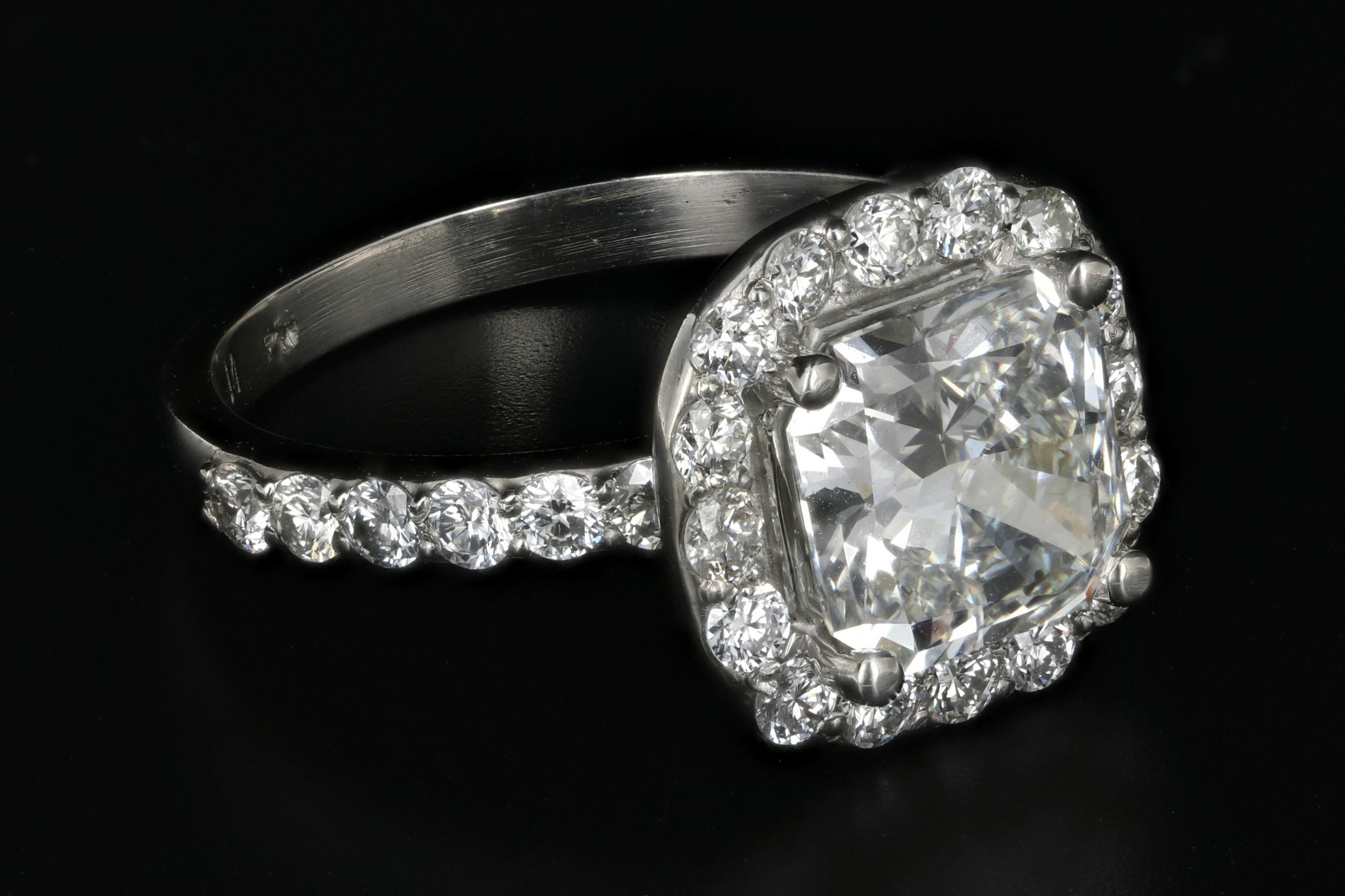 Modern Platinum 2.11 Carat Radiant Diamond Halo Engagement Ring GIA Certified
