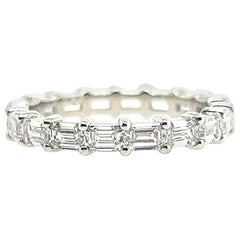 Platinum 2.23 Carat Natural Emerald Cut Near Colorless VS Diamond Eternity Band