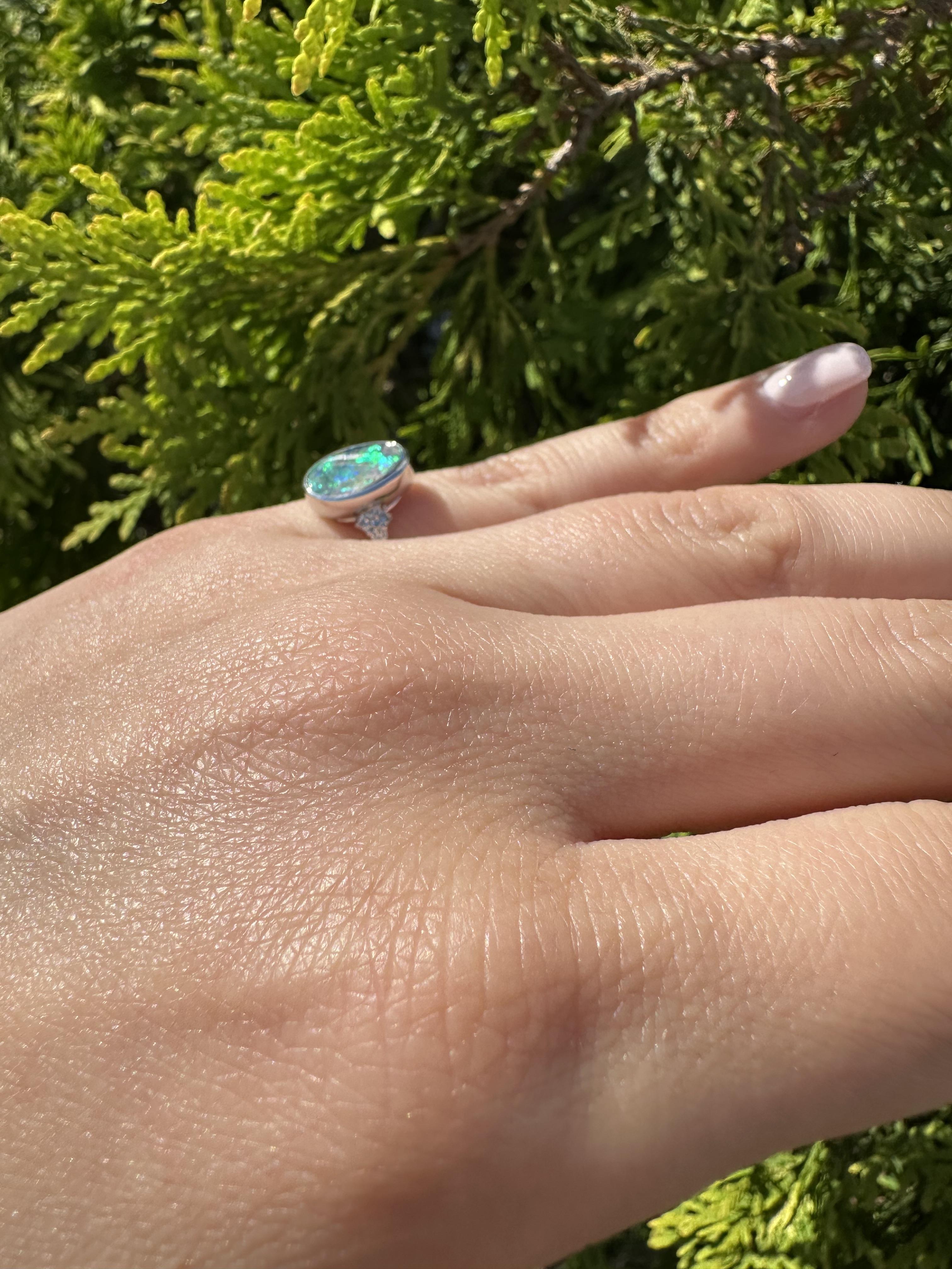 Platinum 2.29ctw Oval Bezel Boulder Opal w/ Diamond Cluster Accents Modern Ring For Sale 5