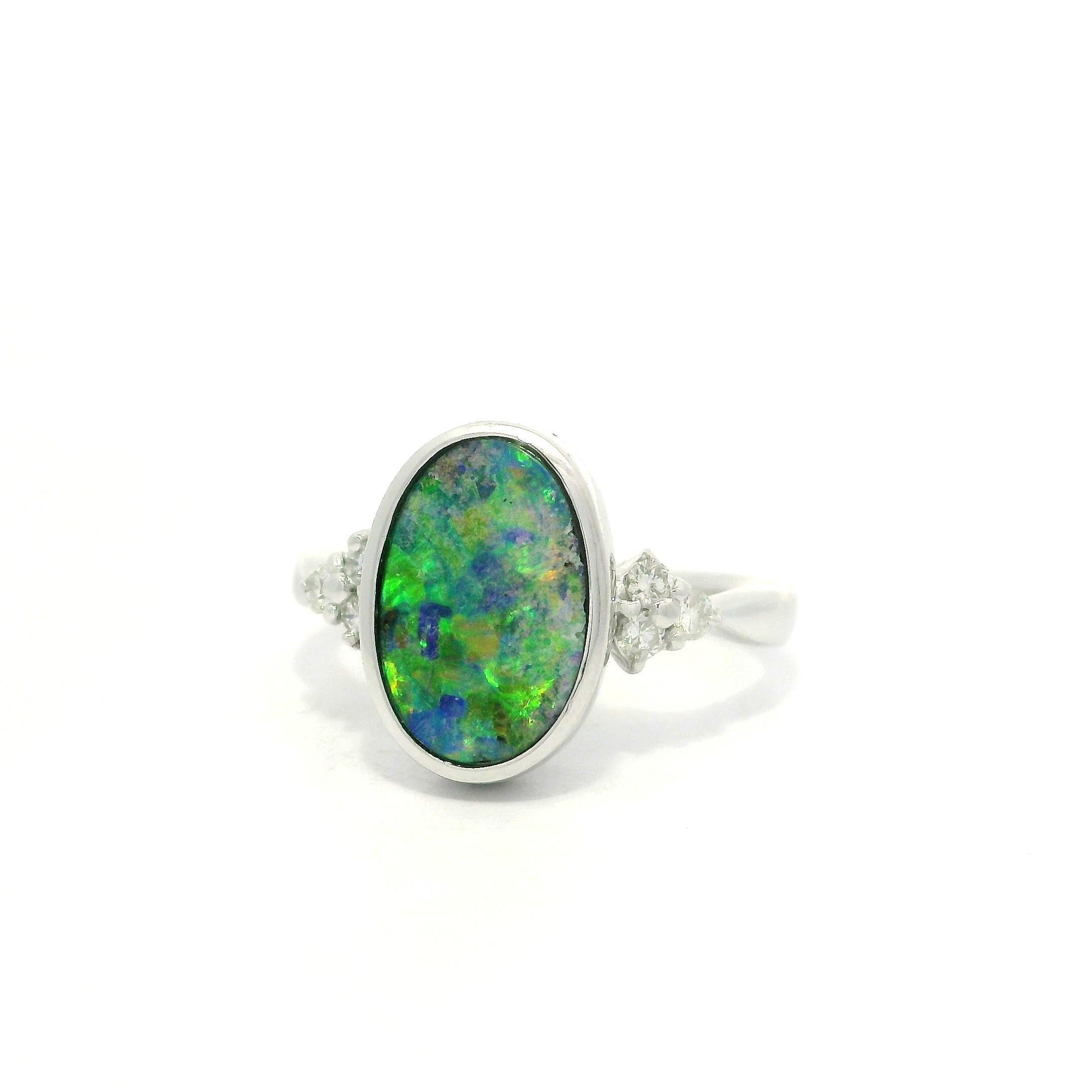 Platinum 2.29ctw Oval Bezel Boulder Opal w/ Diamond Cluster Accents Modern Ring For Sale 9