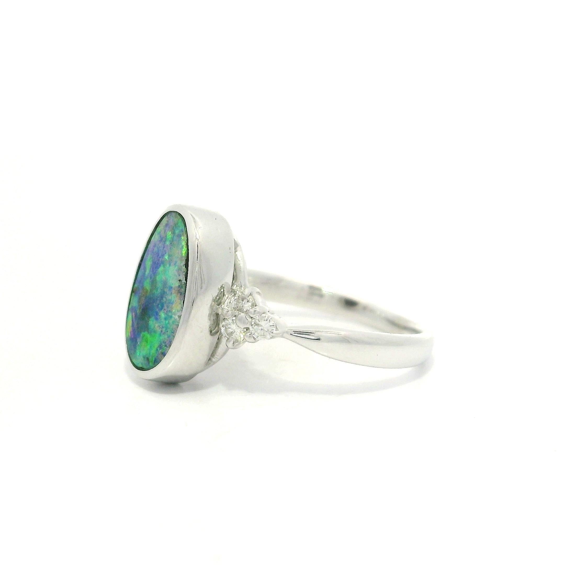 Platinum 2.29ctw Oval Bezel Boulder Opal w/ Diamond Cluster Accents Modern Ring For Sale 10