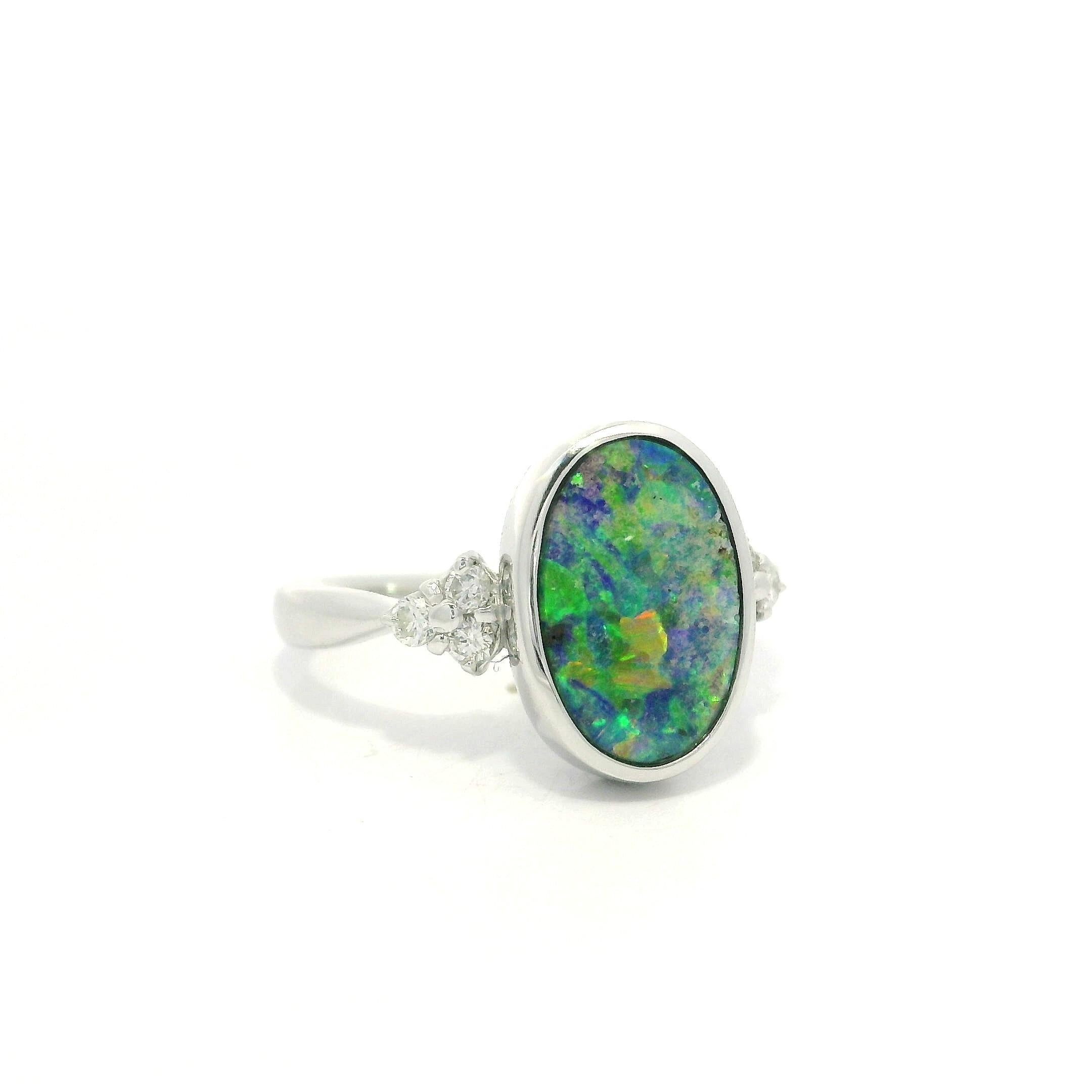 Platinum 2.29ctw Oval Bezel Boulder Opal w/ Diamond Cluster Accents Modern Ring For Sale 13